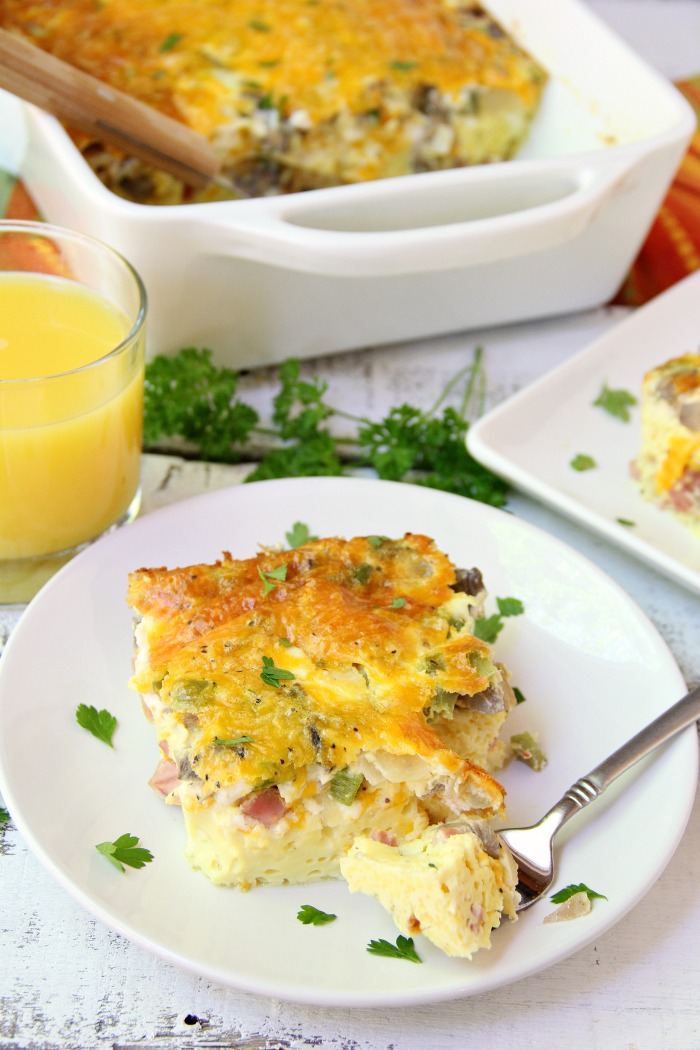 Ultimate Oven Omelette - This breakfast oven omelette is filled with veggies, ham and cheese and baked in the oven. Perfect for a party crowd!