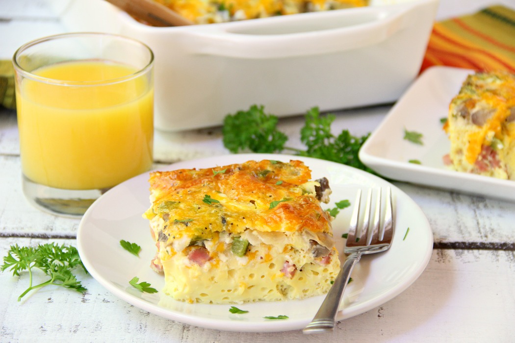 Ultimate Oven Omelette - This omelette is filled with veggies, ham and cheese and baked in the oven. Perfect for a party crowd!