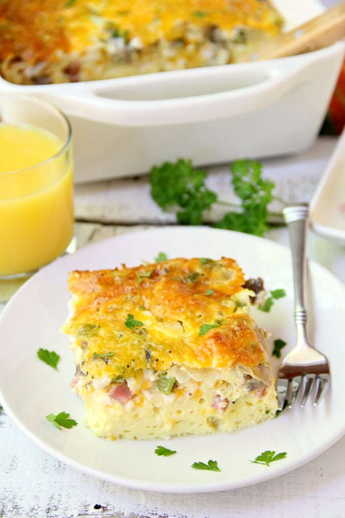 Ultimate Oven Omelette - This breakfast oven omelette is filled with veggies, ham and cheese and baked in the oven. Perfect for a party crowd!