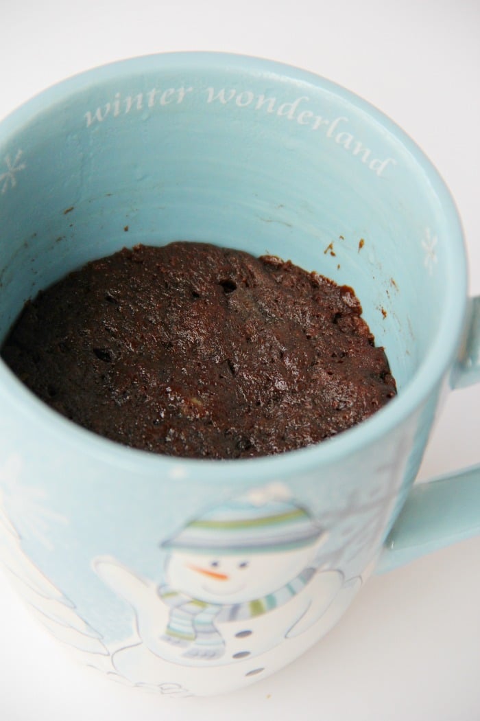 Ultimate Brownie in a Mug - This decadent, five-ingredient rich and fudgy brownie is made in the microwave and ready to enjoy in minutes!