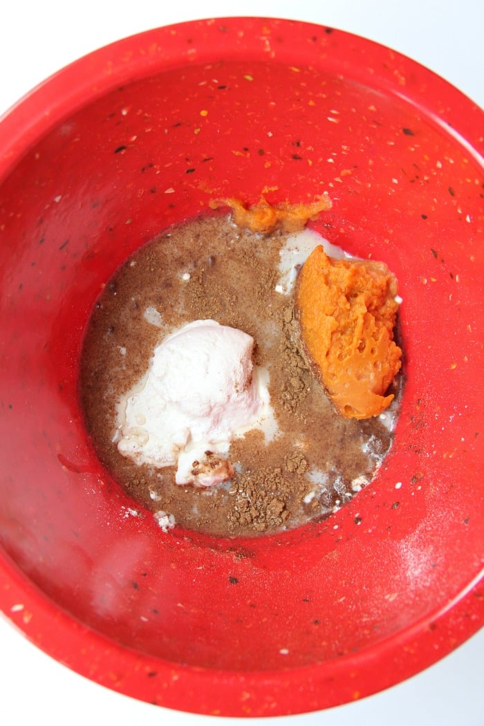 Pumpkin Mug Cake - A quick and easy microwave pumpkin mug cake. Topped with whipped cream and a cinnamon stick, this is the ultimate simple fall dessert!