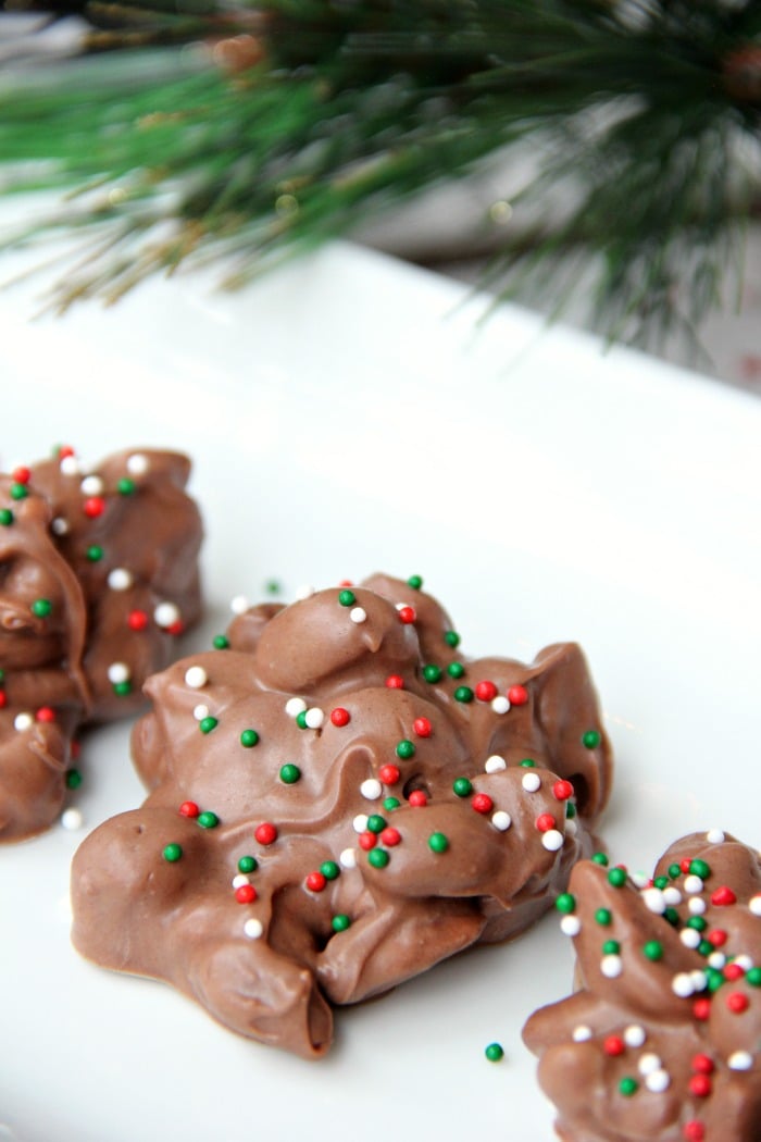 Crockpot Peanut Clusters - Made right in the crockpot in 90 minutes, this decadent treat combines chocolate, peanuts and a taste of peanut butter to make some of the most delicious candy ever!