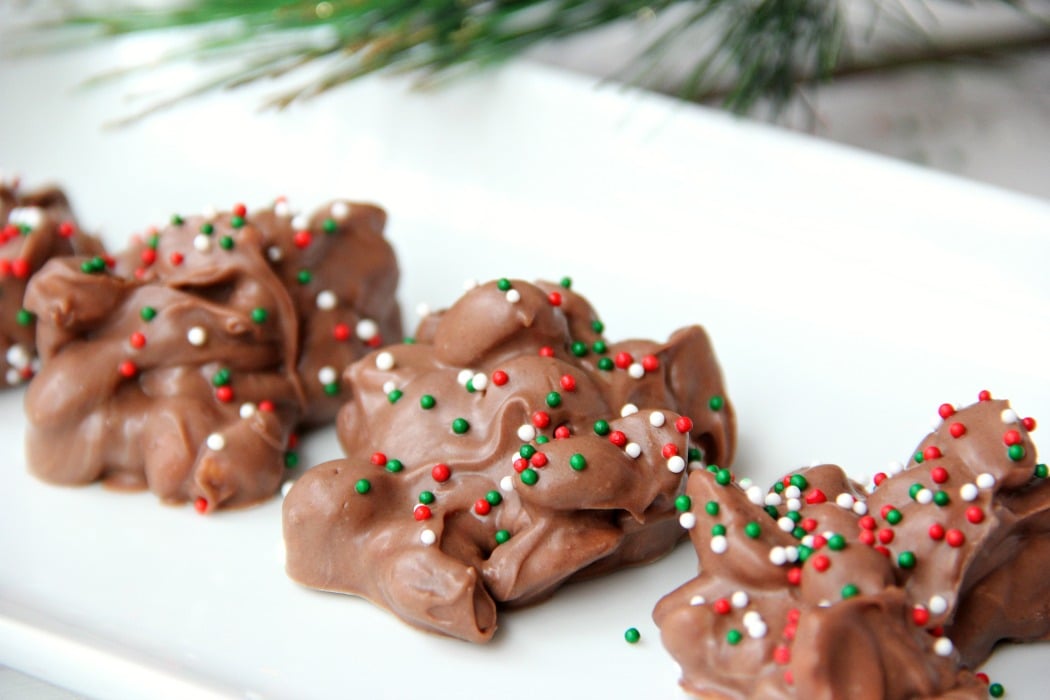 Crockpot Peanut Clusters - Made right in the crockpot in 90 minutes, this decadent treat combines chocolate, peanuts and a taste of peanut butter to make some of the most delicious candy ever!