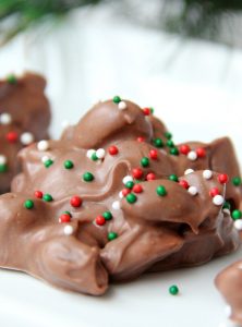 Crockpot Peanut Clusters - Made right in the crockpot in 90 minutes, this decadent treat combines chocolate, peanuts and a taste of peanut butter to make some of the most delicious candy ever!