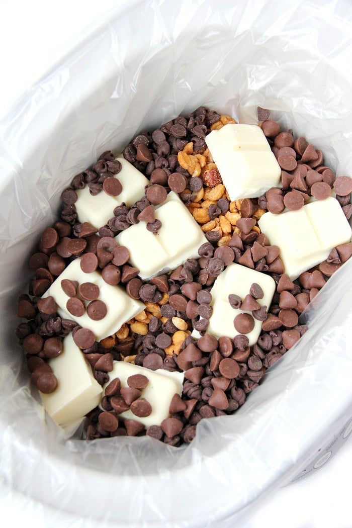 Crockpot Peanut Clusters - Made right in the crockpot in 90 minutes, this decadent treat combines chocolate, peanuts and a taste of peanut butter to make some of the most delicious candy ever! 