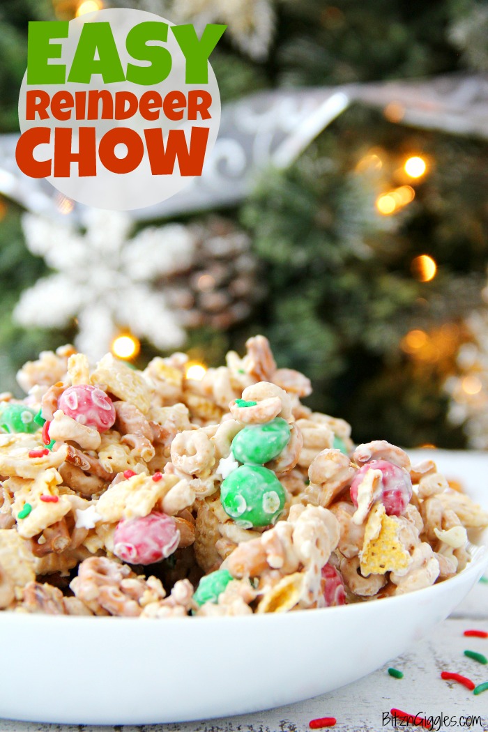 Easy Reindeer Chow - A delicious snack mix filled with pretzels, peanuts, Cheerios, Chex and M&Ms covered in white chocolate. Great for snacking and gift giving!