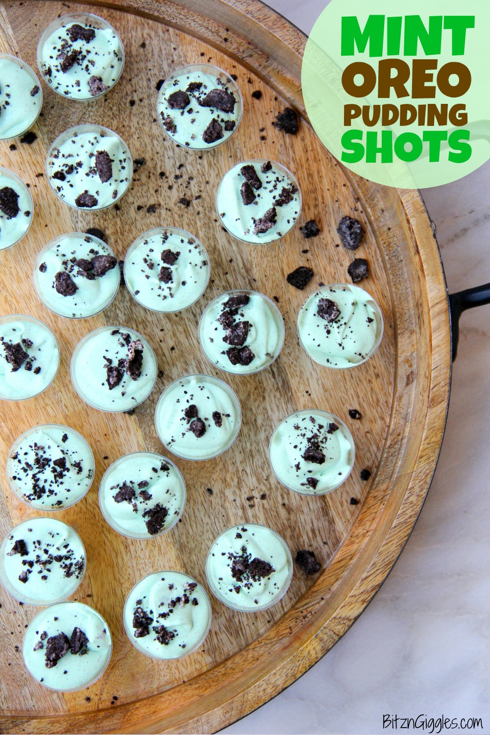 Mint Oreo Pudding Shots - Perfect for the holidays, St. Patrick's Day or just whenever you're in the mood for a little taste of mint and chocolate. These taste just like an adult version of a Thin Mint Girl Scout Cookie! 