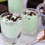 Mint Oreo Pudding Shots - Perfect for the holidays, St. Patrick's Day or just whenever you're in the mood for a little taste of mint and chocolate. These taste just like an adult version of a Thin Mint Girl Scout Cookie!