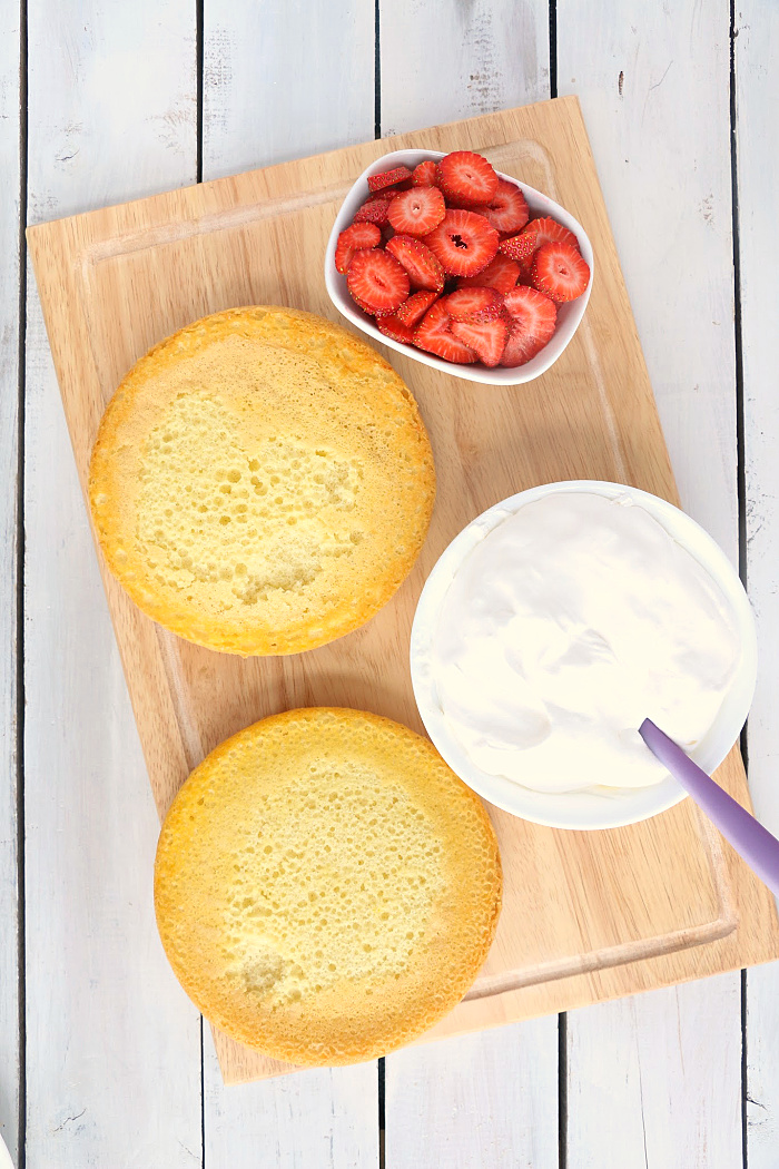 Air Fryer Angel Food Cake - A simple and beautiful layered cake topped with strawberries and cream, made right in the air fryer!