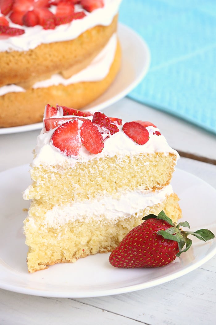 Air Fryer Angel Food Cake - A simple and beautiful layered cake topped with strawberries and cream, made right in the air fryer!