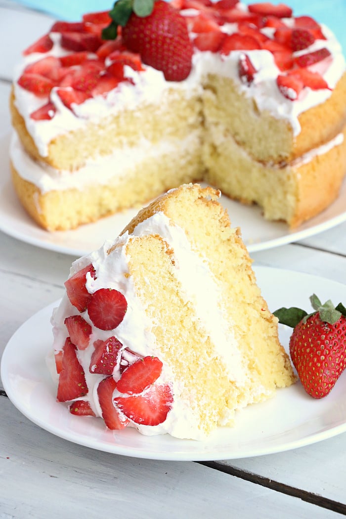 Air Fryer Angel Food Cake - A simple and beautiful layered cake topped with strawberries and cream, made right in the air fryer!