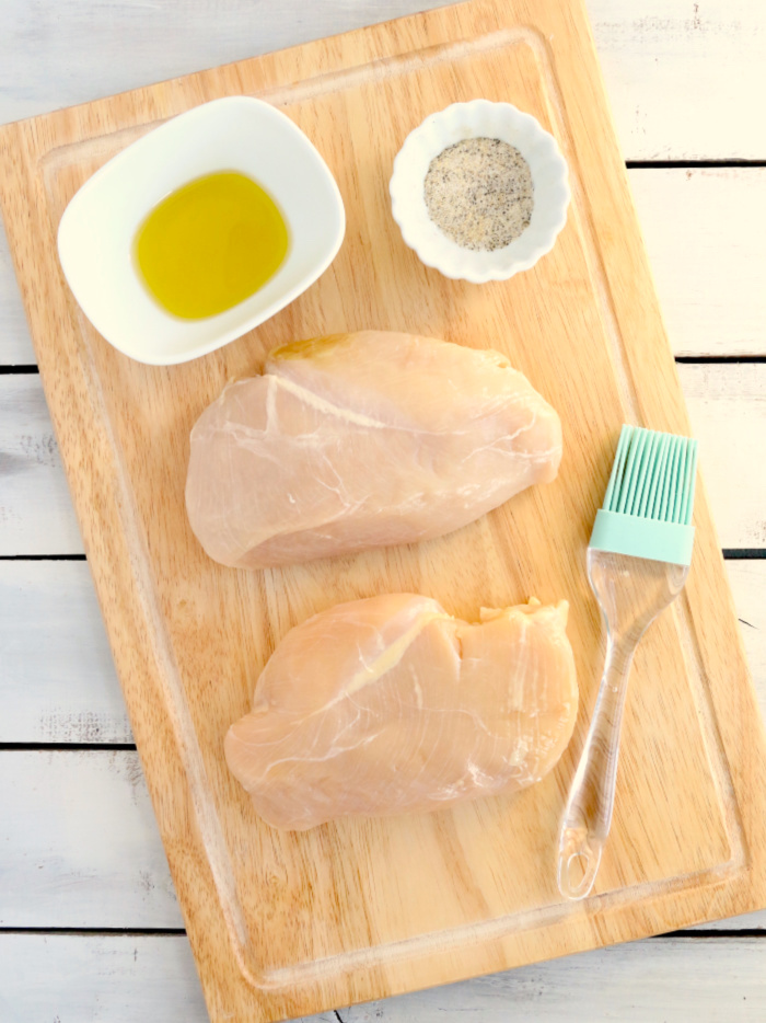 Air Fryer Chicken Breasts - Juicy and flavorful chicken breasts made right in the air fryer! Eat them on their own or add to salads, casseroles or other dishes!