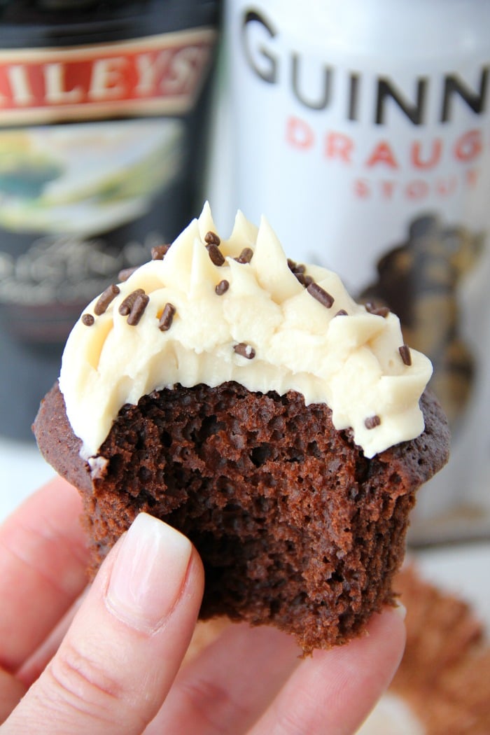 Guinness Cupcakes With Bailey's Frosting - Easy & delicious rich chocolate cupcakes spiked with Guinness and topped with creamy Bailey's Irish Cream frosting!