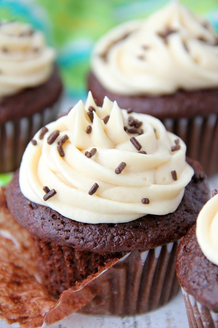 Guinness Cupcakes With Bailey's Frosting - Easy & delicious rich chocolate cupcakes spiked with Guinness and topped with creamy Bailey's Irish Cream frosting!