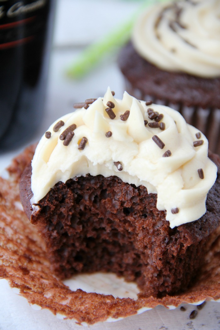 Guinness Cupcakes With Bailey's Frosting - Easy & delicious rich chocolate cupcakes spiked with Guinness and topped with creamy Bailey's Irish Cream frosting!