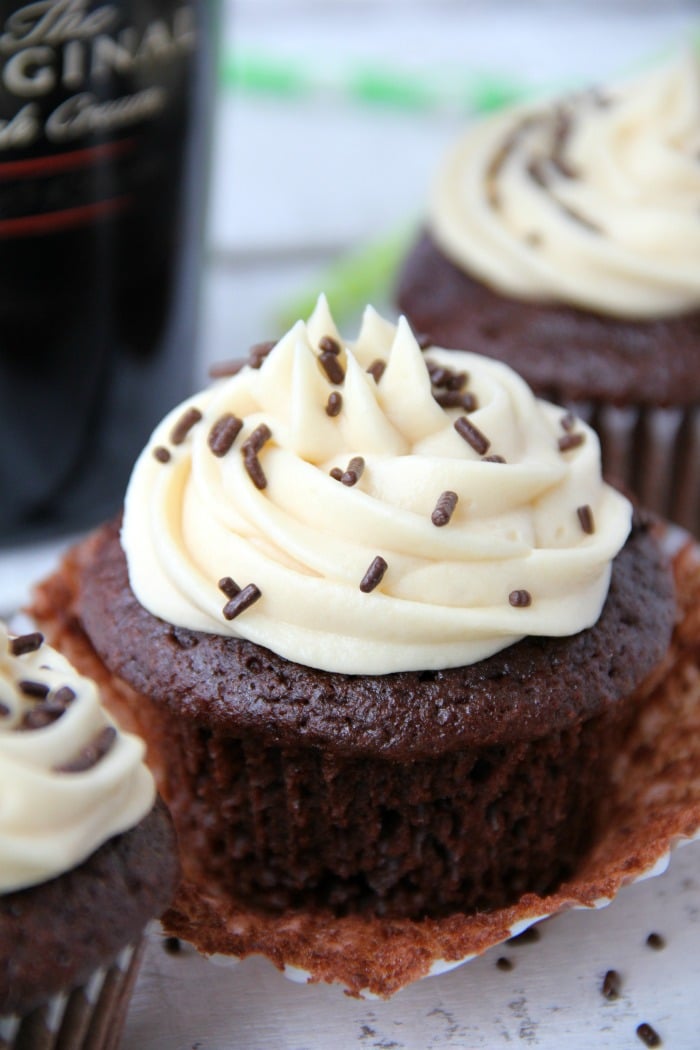 Guinness Cupcakes With Bailey's Frosting - Easy & delicious rich chocolate cupcakes spiked with Guinness and topped with creamy Bailey's Irish Cream frosting!