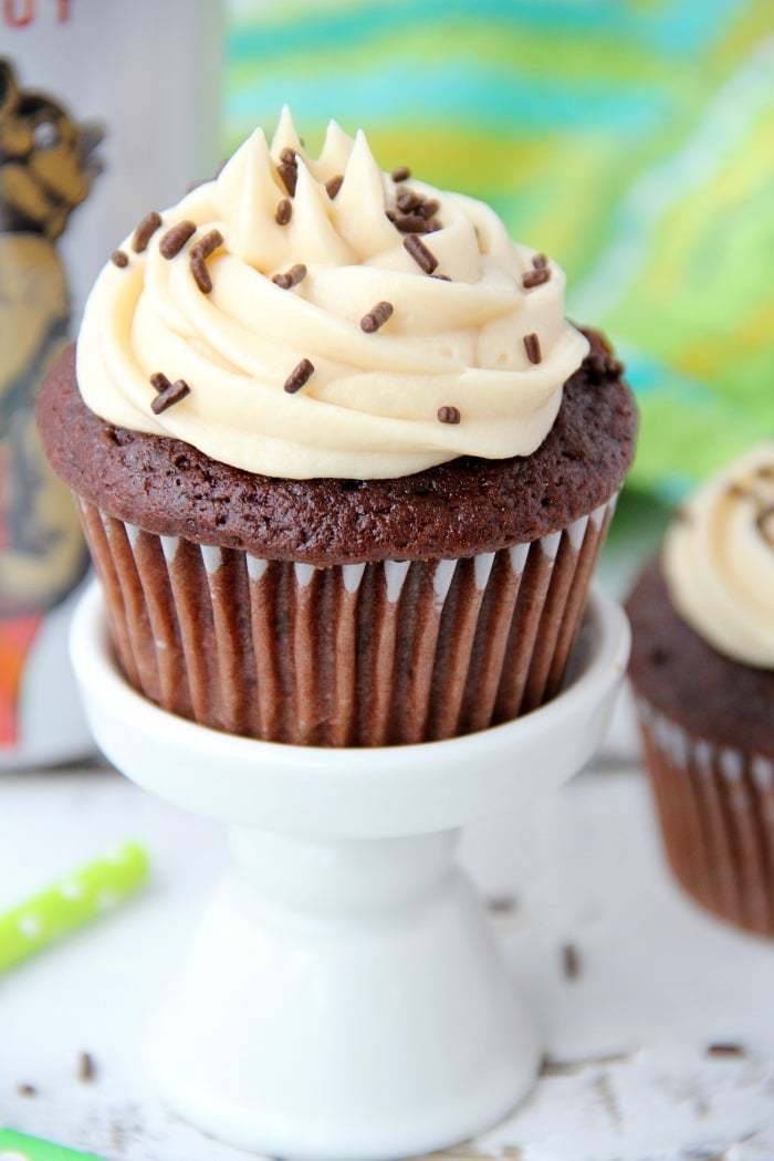 Guinness Cupcakes With Bailey's Frosting - Easy & delicious rich chocolate cupcakes spiked with Guinness and topped with creamy Bailey's Irish Cream frosting!