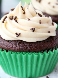 Guinness Cupcakes With Bailey's Frosting - Easy & delicious rich chocolate cupcakes spiked with Guinness and topped with creamy Bailey's Irish Cream frosting!