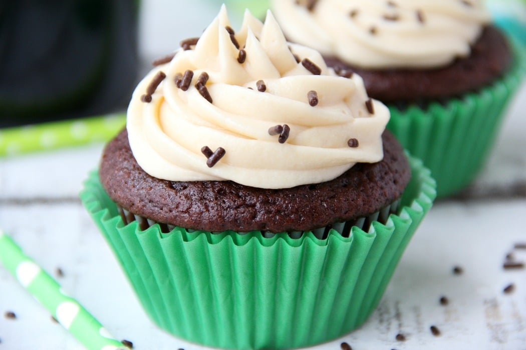 Guinness Cupcakes With Bailey's Frosting - Easy & delicious rich chocolate cupcakes spiked with Guinness and topped with creamy Bailey's Irish Cream frosting!