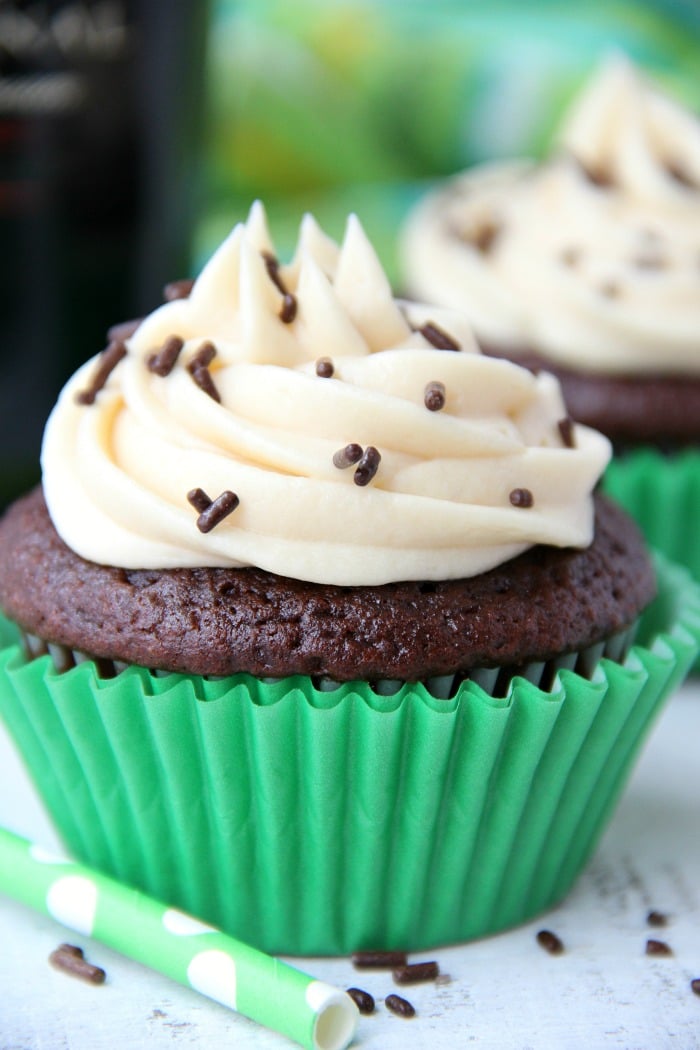 Guinness Cupcakes With Bailey's Frosting - Easy & delicious rich chocolate cupcakes spiked with Guinness and topped with creamy Bailey's Irish Cream frosting!