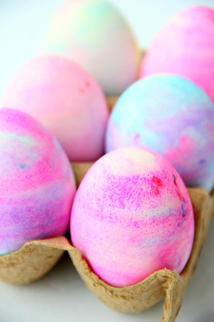 Cool Whip Easter Eggs - Cool Whip helps produce swirls of gorgeous color in this family-friendly DIY easter egg dyeing method!