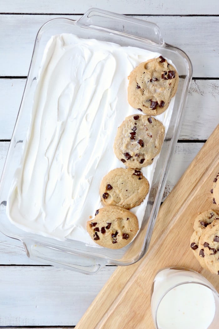 Chocolate Chip Cookie Lasagna - A delicious 4-ingredient, no bake layer dessert made with soft chocolate chip cookies and creamy whipped topping.