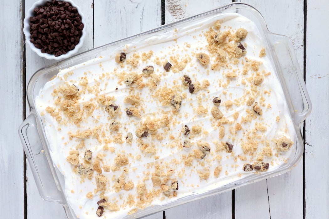 Chocolate Chip Cookie Lasagna - A delicious 4-ingredient, no bake layer dessert made with soft chocolate chip cookies and creamy whipped topping.