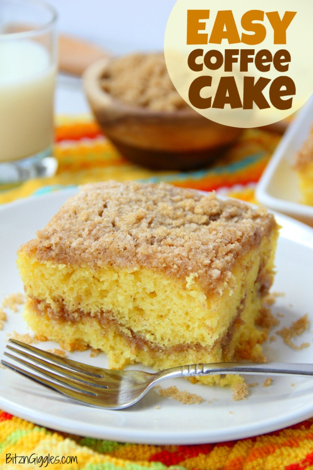 Easy Coffee Cake - A delicious and easy coffee cake made with a doctored-up yellow cake mix and filled and topped with crumbly, buttery cinnamon streusel!