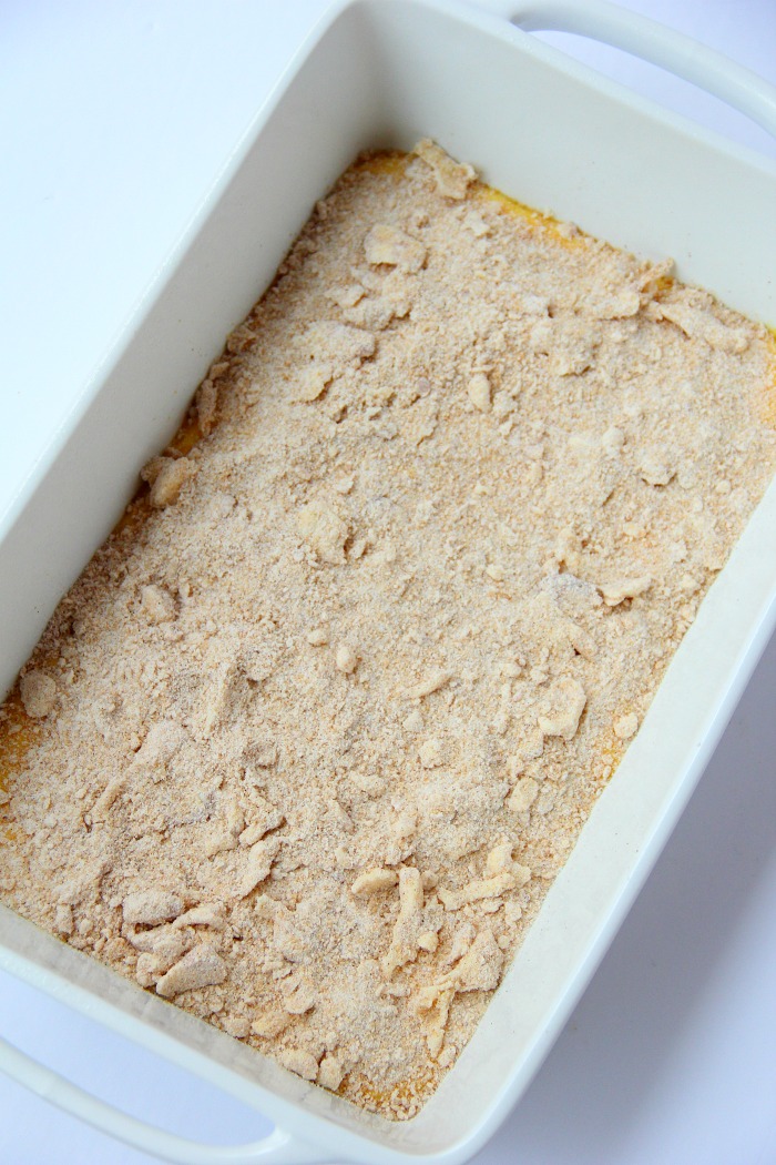 Easy Coffee Cake - A delicious and easy coffee cake made with a doctored-up yellow cake mix and filled and topped with crumbly, buttery cinnamon streusel!