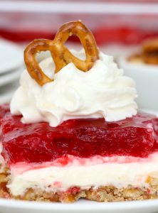 Strawberry Pretzel Dessert - This classic, potluck favorite features a crunchy pretzel crust topped with sweet cream and an irresistible strawberry jello topping. It's the perfect combination of sweet and salty!