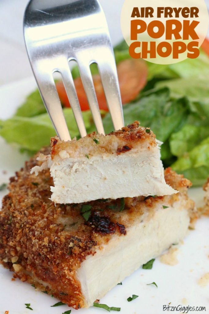 Air Fryer Pork Chops - Pork chops dredged in ranch dressing, coated in a parmesan cheese breadcrumb mixture and air fried to perfection. Tender on the inside and crispy on the outside!