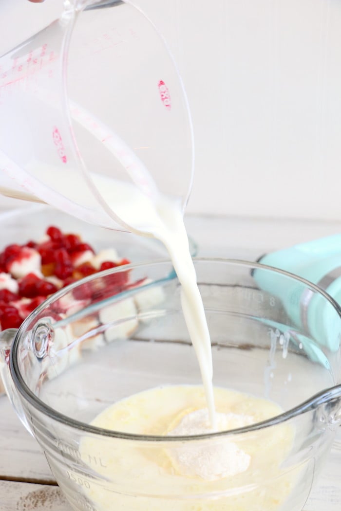 No Bake Cherry Dump Cake - An easy, no-bake cherry trifle dessert withÂ layers of angel food cake, sour cream, pudding, cherry pie filling and whipped topping.