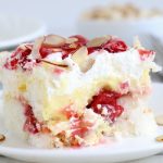 No Bake Cherry Dump Cake - An easy, no-bake cherry trifle dessert with layers of angel food cake, sour cream, pudding, cherry pie filling and whipped topping.
