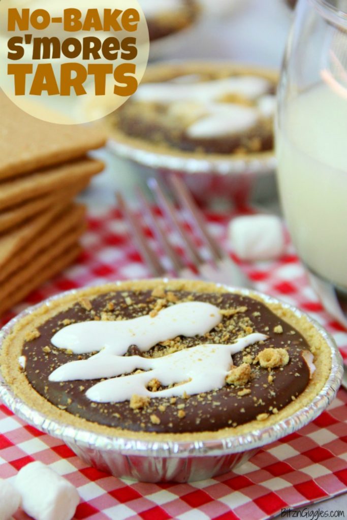 No-Bake S'mores Tarts - A delicious spin on the traditional s'more. These 5-ingredient mini pies are filled with marshmallow creme, chocolate and peanut butter. The perfect end to a summer BBQ!