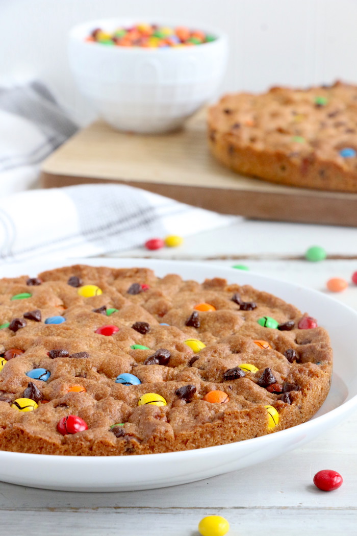 Air Fryer Pizookie - A soft and chewy cookie filled with mini chocolate chips and M&Ms made right in the air fryer in under 10 minutes! Large enough to serve a crowd!