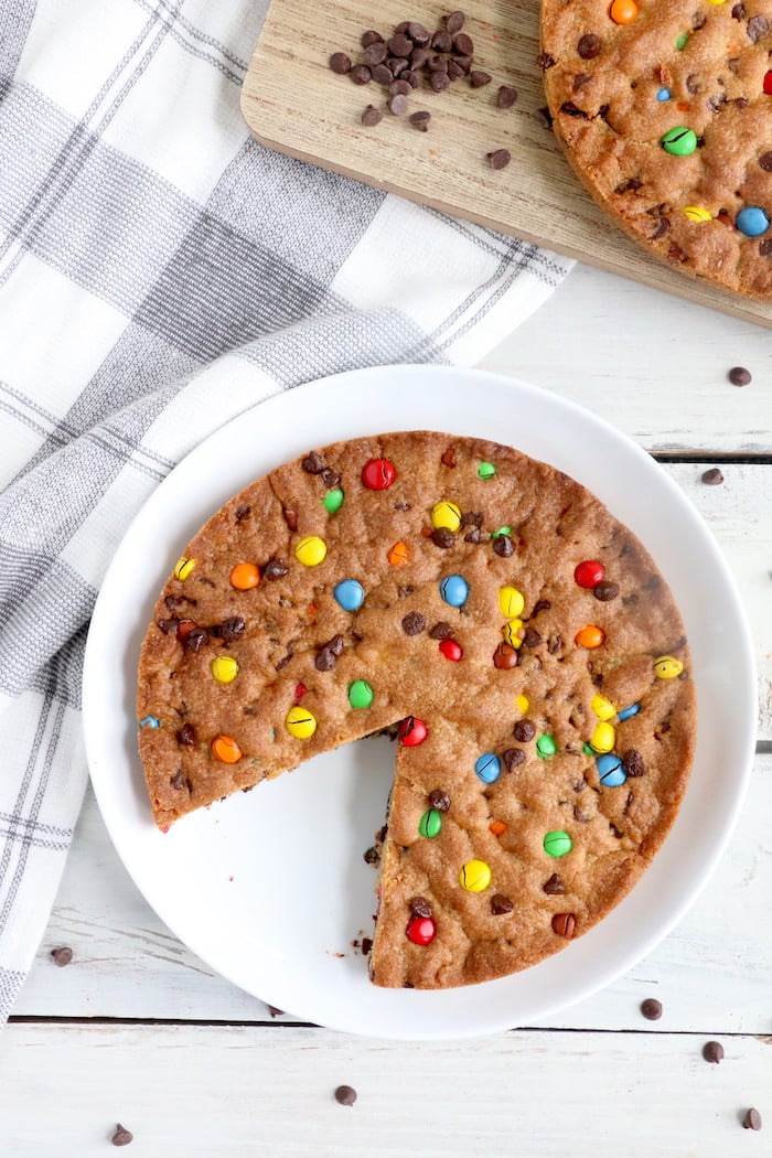 Air Fryer Pizookie - A soft and chewy cookie filled with mini chocolate chips and M&Ms made right in the air fryer in under 10 minutes! Large enough to serve a crowd!