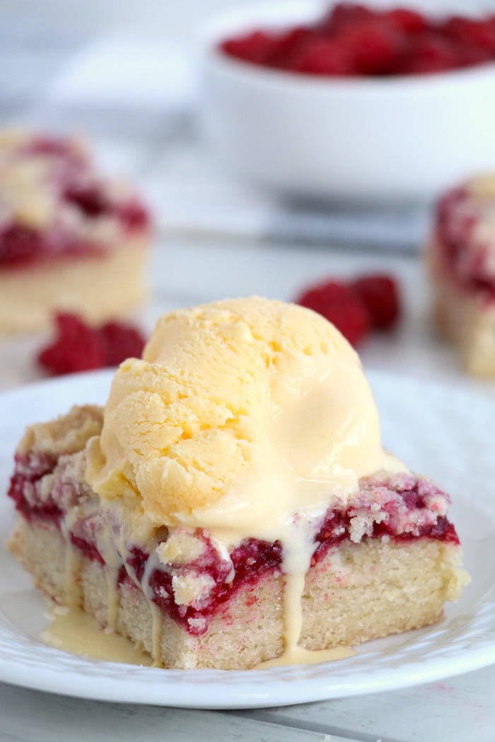 Raspberry Crumble Bars - Fresh, fruity raspberry bars with a buttery crumb topping!