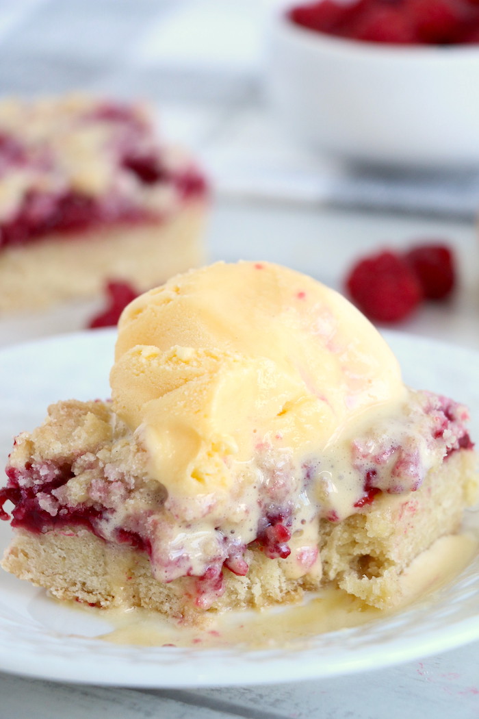 Raspberry Crumble Bars - Fresh, fruity raspberry bars with a buttery crumb topping!