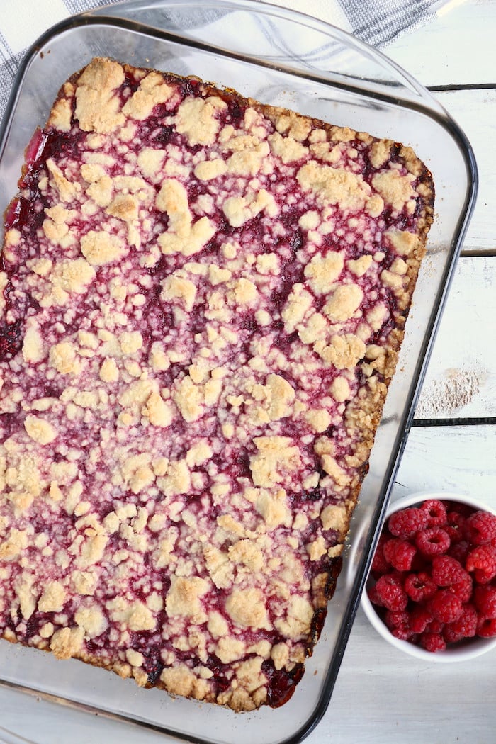 Raspberry Crumble Bars - Fresh, fruity raspberry bars with a buttery crumb topping!