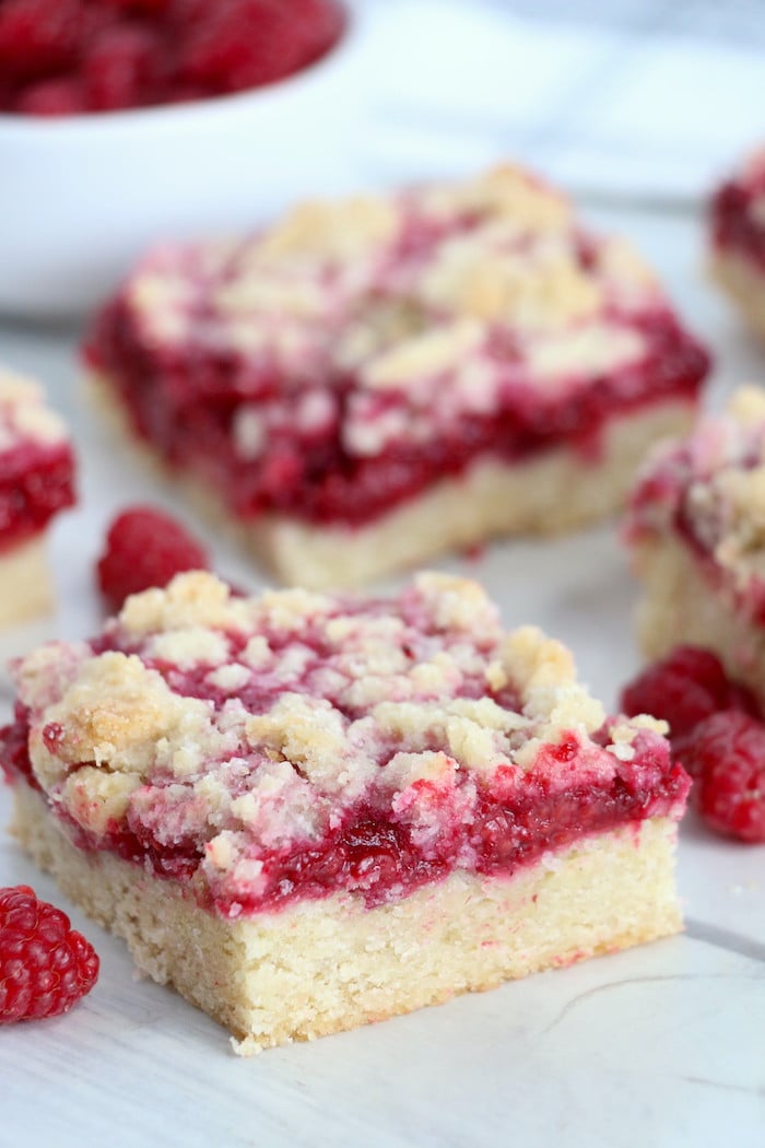 Raspberry Crumble Bars - Fresh, fruity raspberry bars with a buttery crumb topping!