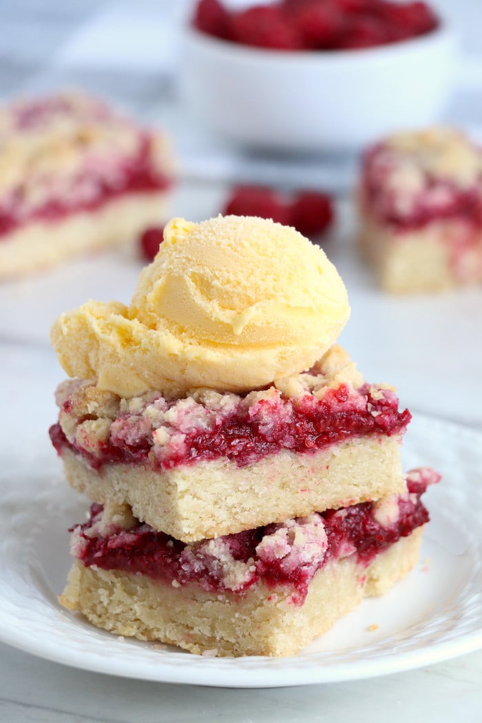 Raspberry Crumble Bars - Fresh, fruity raspberry bars with a buttery crumb topping!