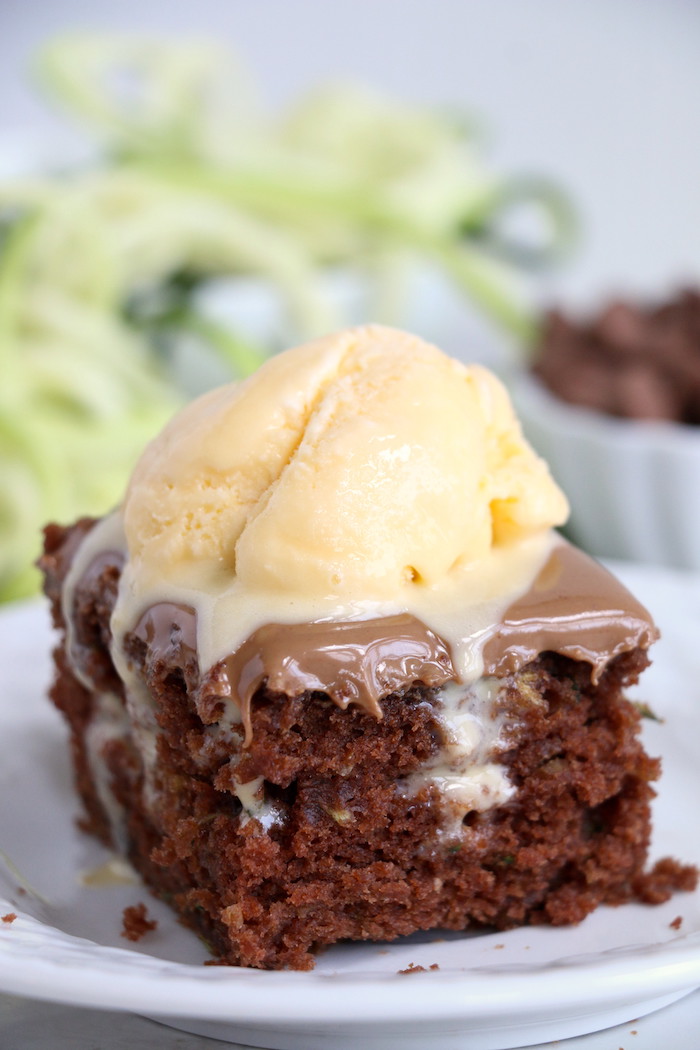 Zucchini Cake - Rich and moist chocolate zucchini cake topped with chocolate peanut butter frosting. 