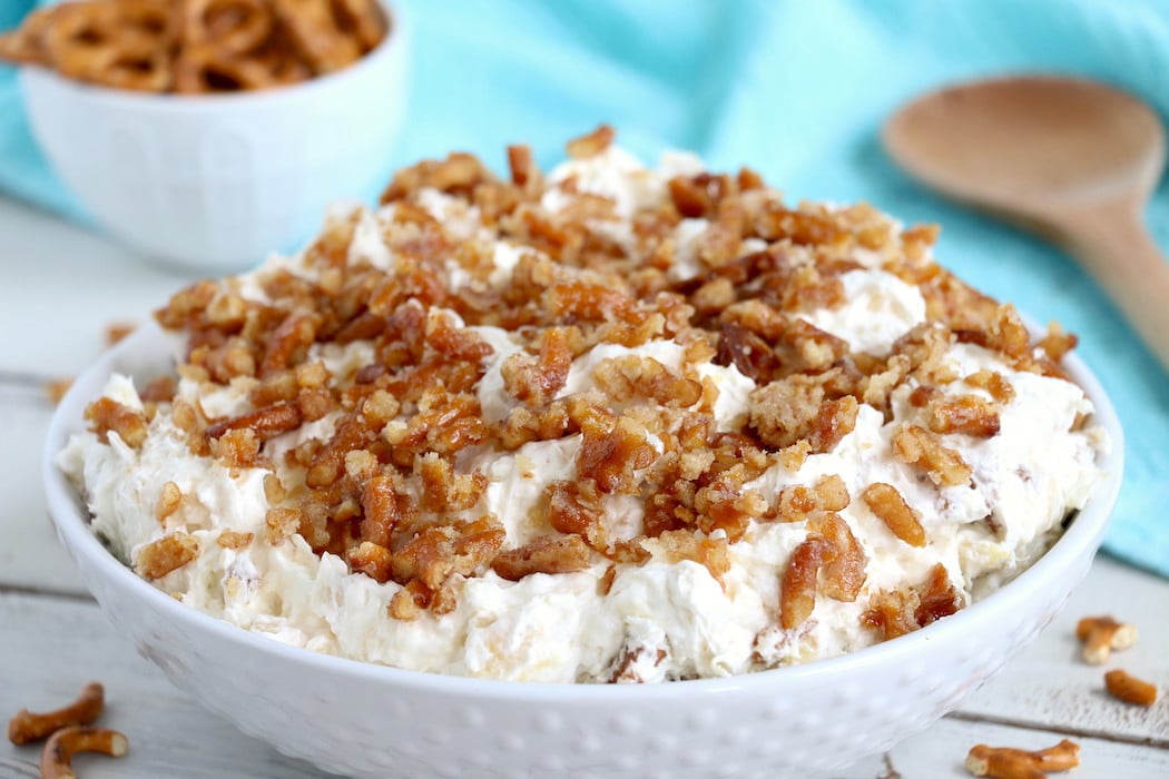 Pineapple Pretzel Salad - This cool, creamy pineapple fluff filled with candied pretzels is the perfect combination of sweet and salty, and can be served as a dessert or sweet side dish!Â 