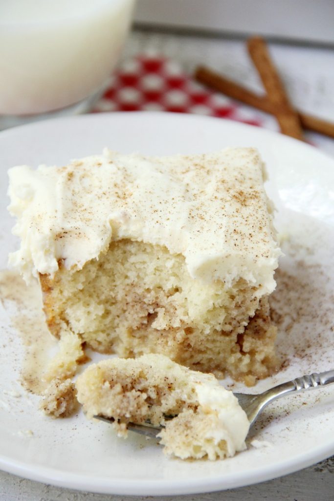 Cinnamon Roll Poke Cake - Bitz & Giggles