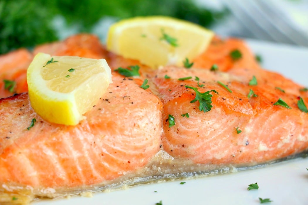 salmon up close with lemon slices