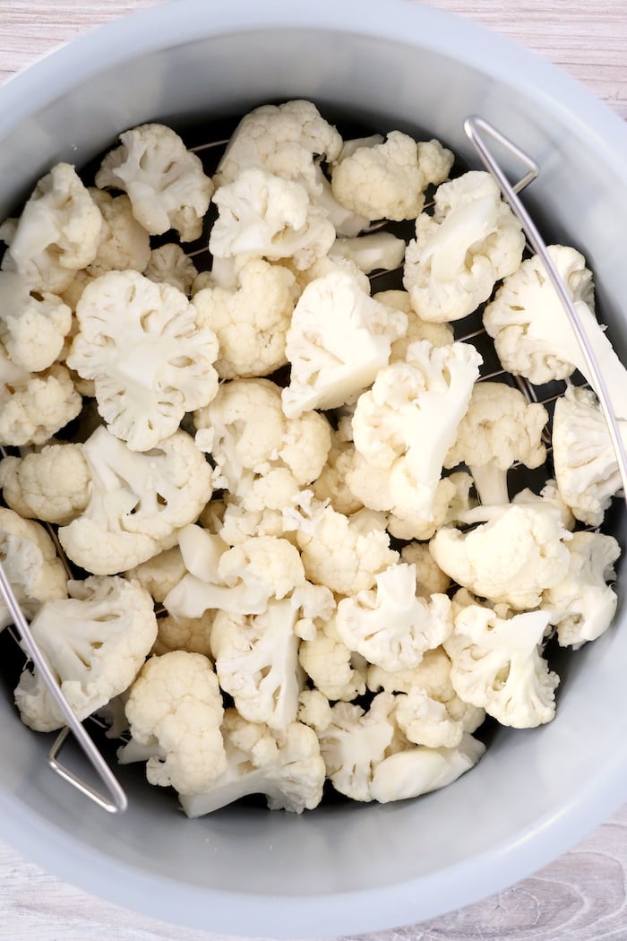 cauliflower florets in Ninja Foodi steamer basket