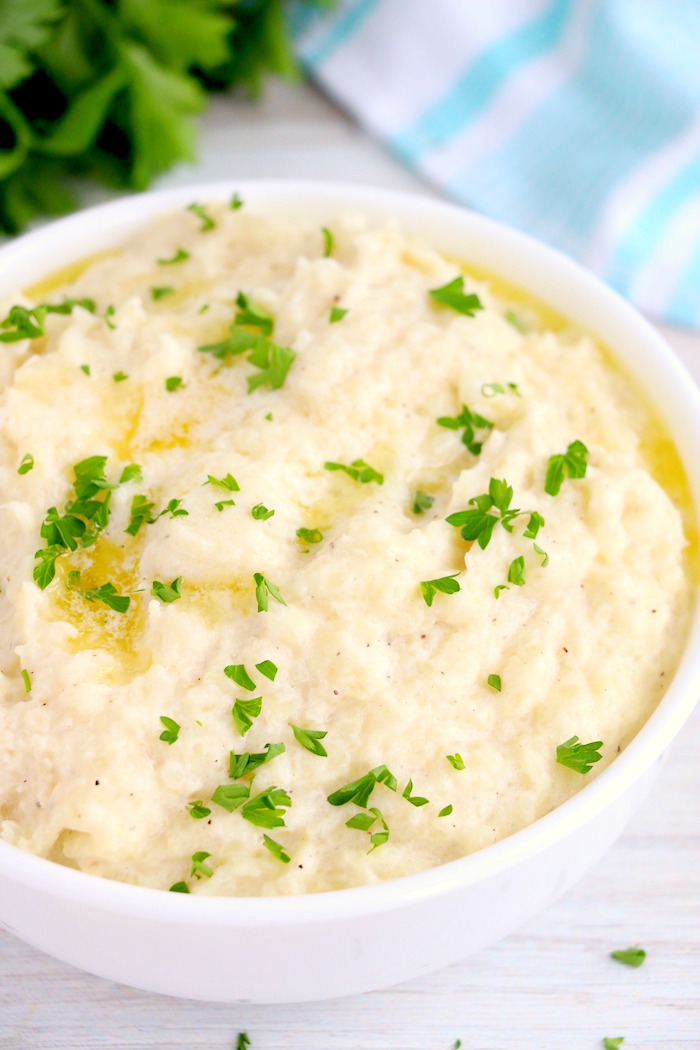 close up shot of mashed cauliflower in a bowl