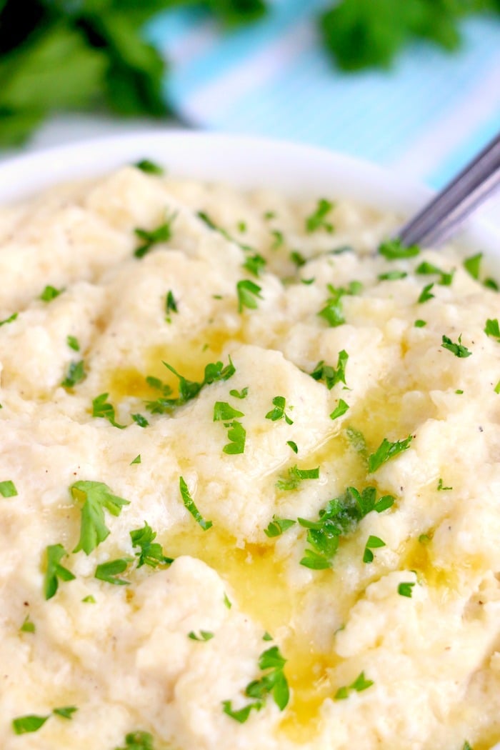 up close shot of mashed cauliflower in bowl