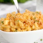 bowl of macaroni and cheese with spoon