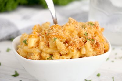 bowl of macaroni and cheese with spoon